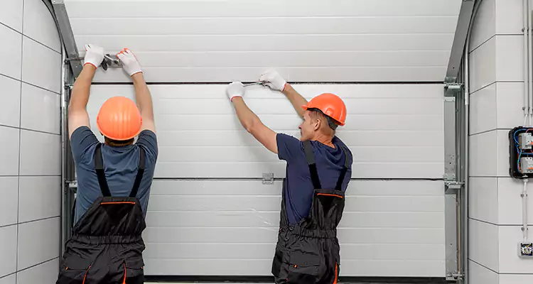 Garage Door Bottom Panel Repair in Bloomingdale, FL